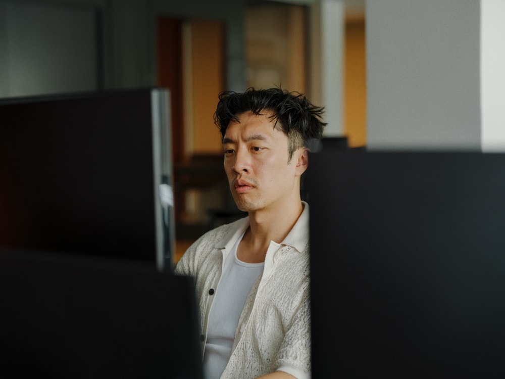 A colleague concentrating at his desk