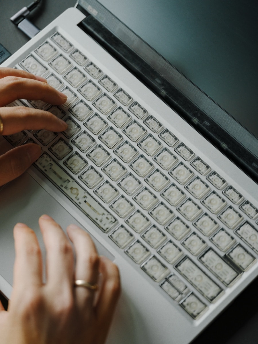 Close-up of hands at a keyboard